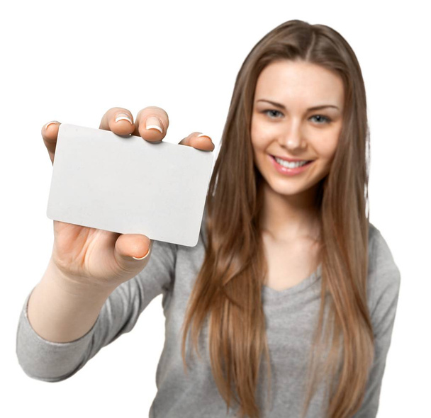 young woman holding blank card - Foto, imagen
