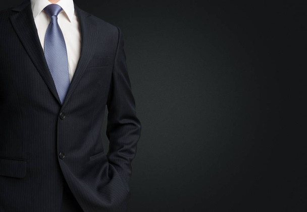 businessman in suit on black - Foto, Imagen
