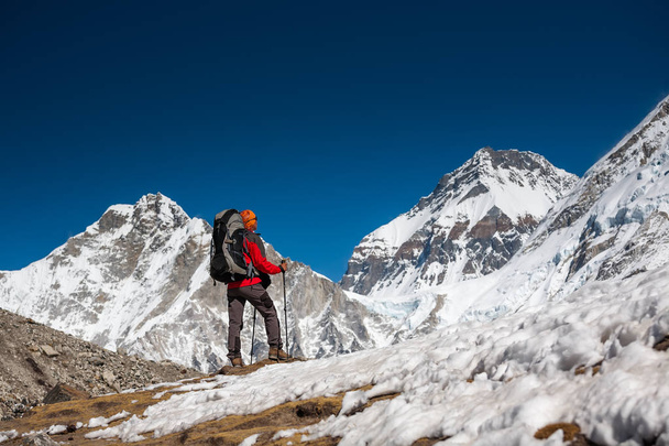 Trekker approaching PumoRi mountain in Khumbu valley on a way to - Photo, Image