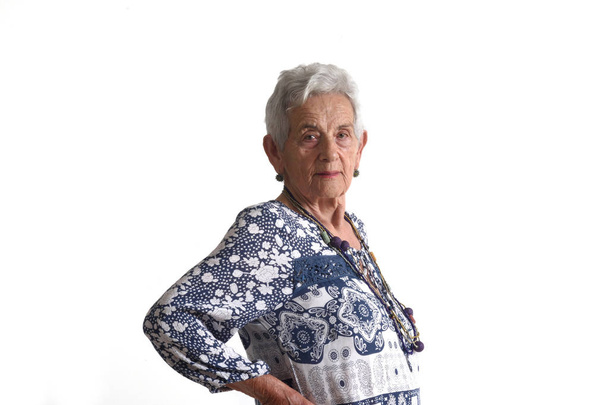portrait of a senior woman on white - Foto, afbeelding