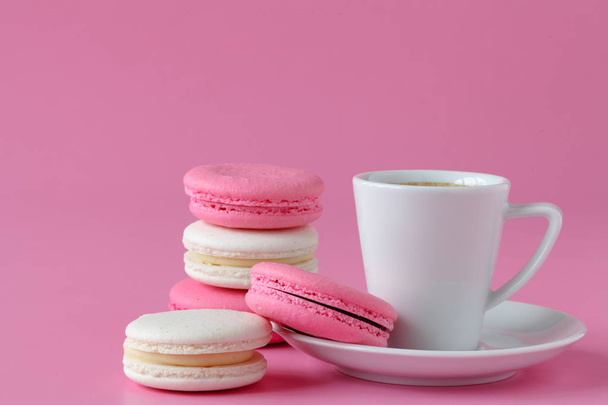 Set of pink macaroon with coffee cup - Fotó, kép