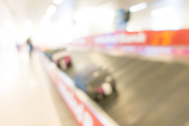 Abstract blur of Suitcase on luggage conveyor belt .   - Photo, image
