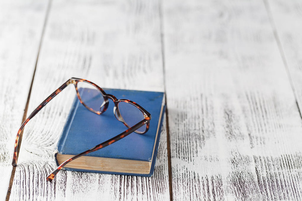Lying book and glasses. - Photo, Image