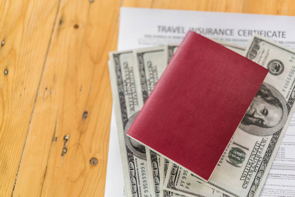 Blank passport with US dollars on wood table over Travel Aviatio - Фото, изображение