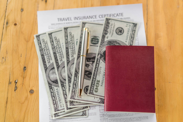 Blank passport with US dollars on wood table over Travel Aviatio - Valokuva, kuva