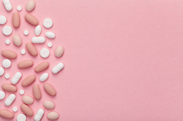 Medical Pills for Woman on Pink Background  - Valokuva, kuva