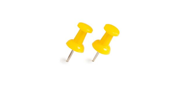 two isolated yellow push pins in white background - Photo, Image