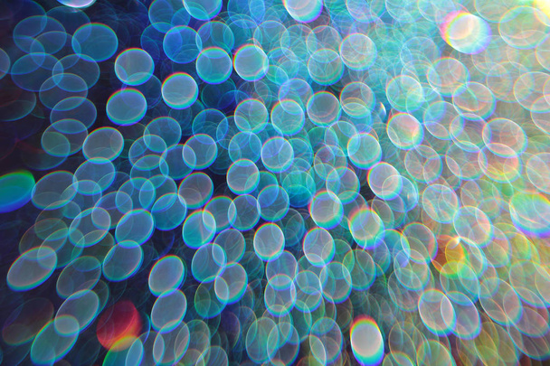 Multicolor bokeh abstract background caused by spray water. - Photo, Image