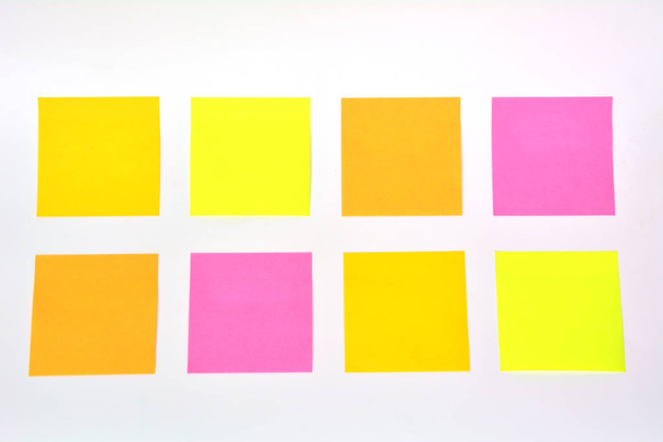 Yellow, orange and pink stick note isolated on white background - Foto, Imagem
