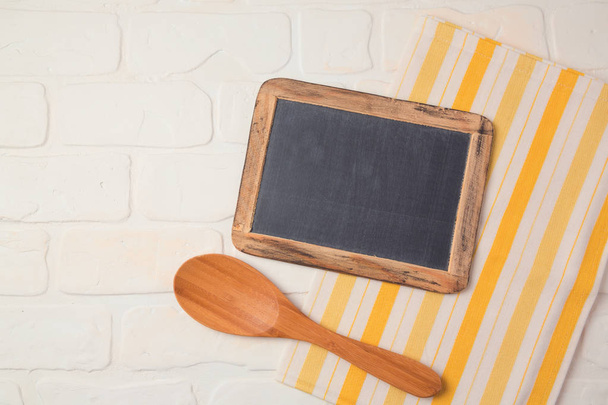 chalkboard, tablecloth and spoon  - Foto, Imagen