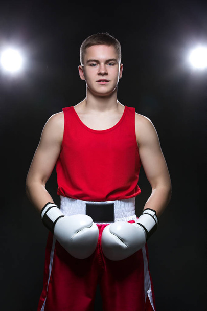 Young boxer in red form - Photo, Image