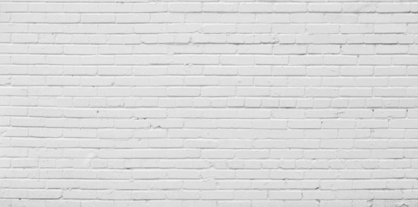 Brick wall painted with white paint. - Фото, зображення