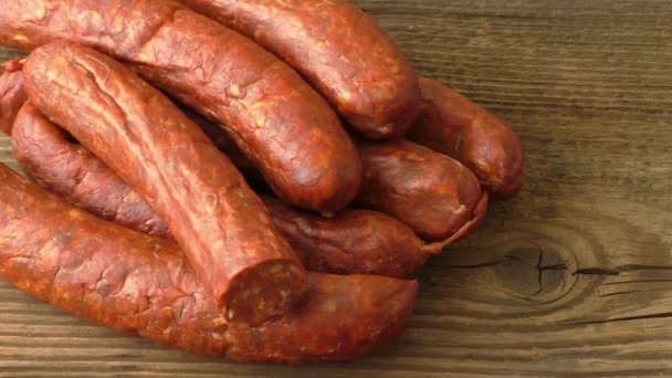 Homemade smoked sausage on a cutting board - Footage, Video