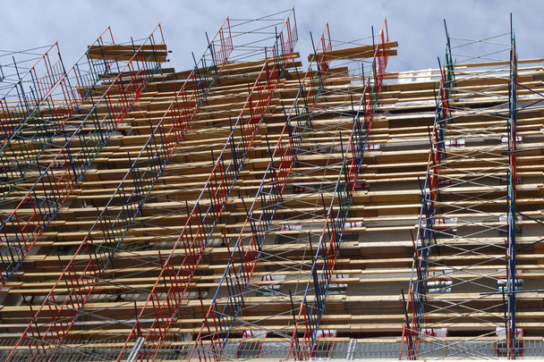 steiger bouwen renovatie bouw site wolkenkrabber - Foto, afbeelding