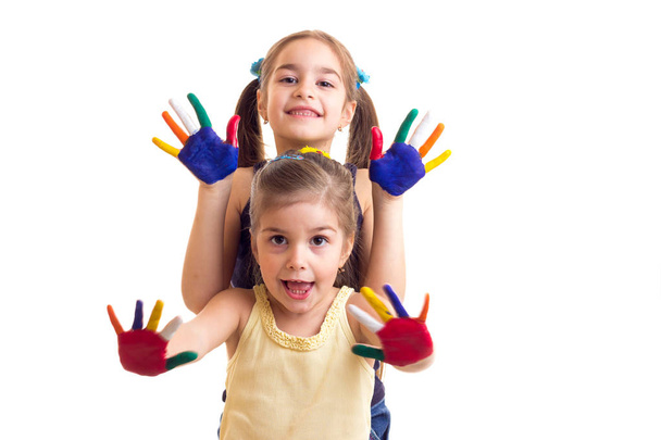 Little girls with colored hands - Photo, Image