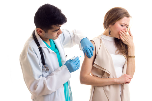 Male octor making injection of young woman - Photo, image