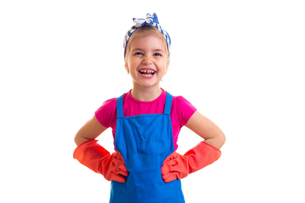 Girl in apron and gloves - Foto, afbeelding