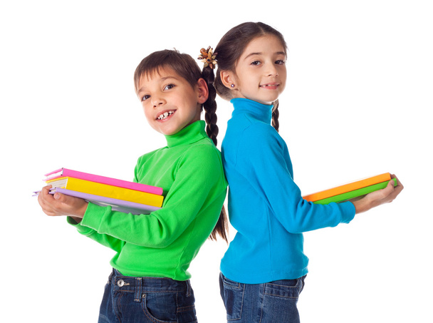 Kids standing with stack of books - Foto, imagen