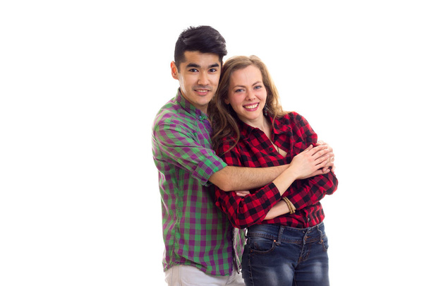Giovane coppia in camicie a quadri
 - Foto, immagini