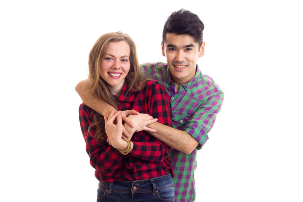Молодая пара в клетчатых рубашках
 - Фото, изображение