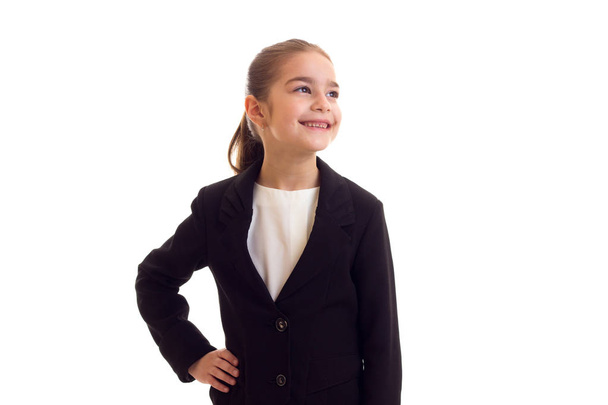 Little girl in black jacket - Φωτογραφία, εικόνα
