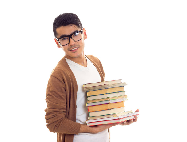 Junger Mann mit Brille und Büchern - Foto, Bild