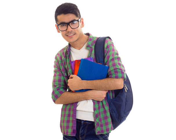 Молодий чоловік з рюкзаком і книгами
 - Фото, зображення