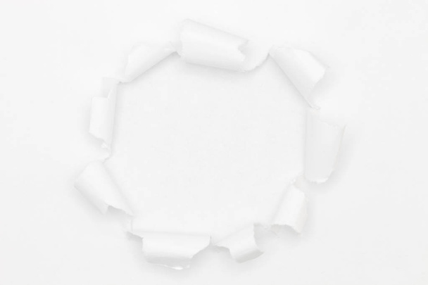 White torn paper on white background. - Photo, Image