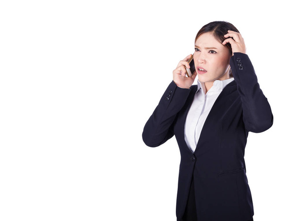 worried business woman talking on smartphone isolated on white  - Zdjęcie, obraz
