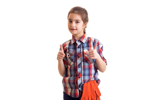 Маленька дівчинка з помаранчевими рукавичками
 - Фото, зображення