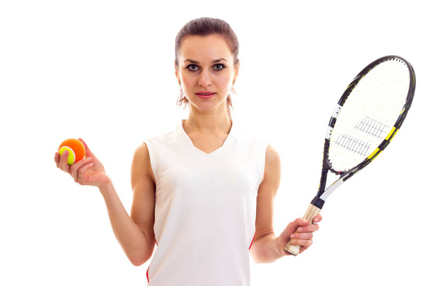 Woman with tennis racquet and ball - Fotografie, Obrázek
