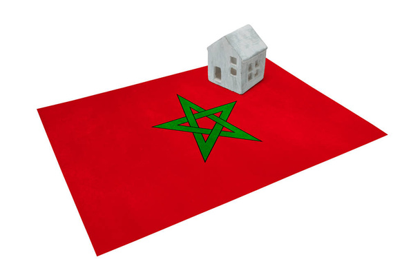 Kleines Haus auf einer Fahne - Marokko - Foto, Bild