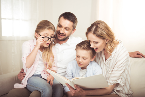 Happy family reading  - Фото, зображення