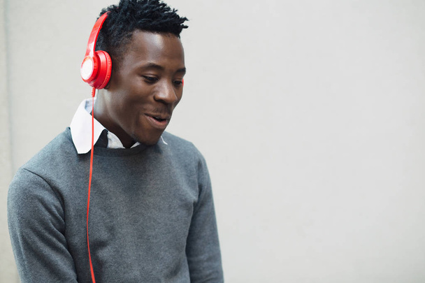 African american man listen music with headphones - Foto, Bild