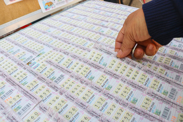 Thai government lottery tickets. Lottery tickets are sold in pai - Photo, Image