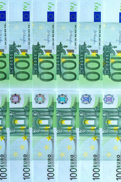abstracte achtergrond van geld uit bankbiljetten van 100 euro - Foto, afbeelding
