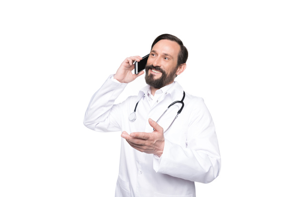 Doctor talking on smartphone  - Foto, Imagen