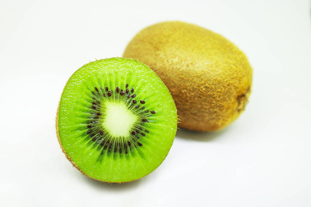 Fresh kiwi fruit isolated on white background. Kiwifruit its hea - Foto, Bild