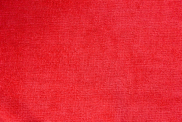 close up shot of red microfiber cloth texture for background - Fotó, kép