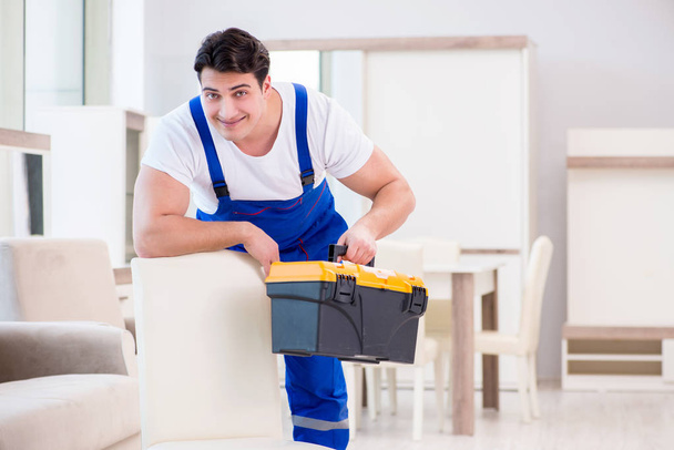 Furniture repairman working in store - Photo, Image