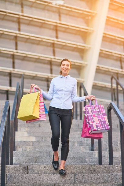 Woman carrying shopping bags. - Photo, image