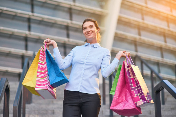 Joyful woman with shopping bags. - Photo, Image