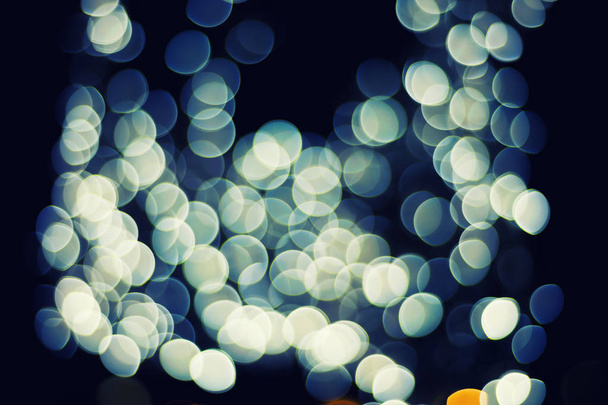 Боке Рождество светлая ночь абстрактно на черном фоне
  - Фото, изображение