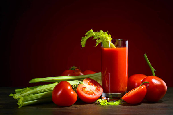 Tomato juice with celery sticks  - Photo, Image