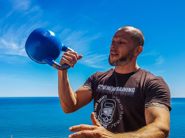 Kettlebell Trainer with a Clean too High: Incorrect - Photo, Image