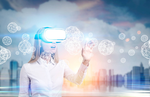 Businesswoman in vr glasses and spheres - Foto, imagen