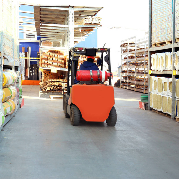 Stacking truck in wholesale warehouse - Photo, Image