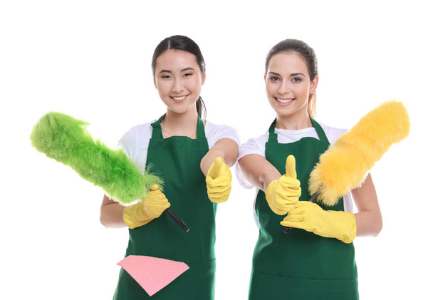Cleaning service team in green aprons on white background - Foto, Imagem