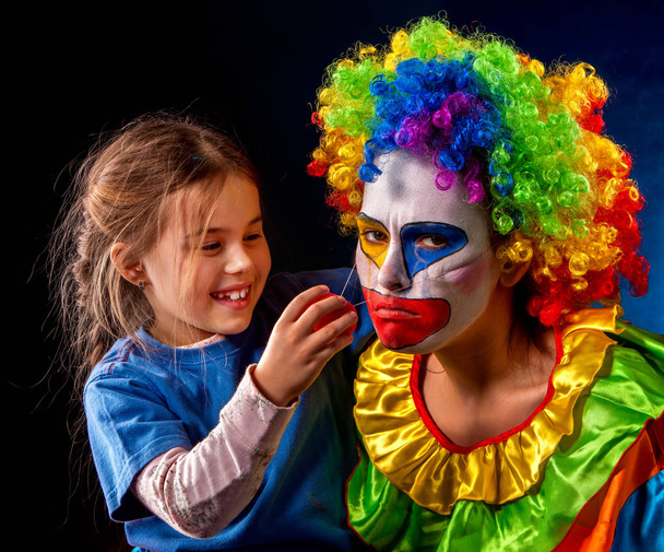 Single parent family. Mom after work birthday clown .Adult child relationship. - Photo, Image