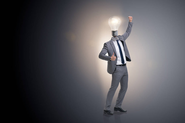 Businessman in new idea concept with light bulb - Photo, Image
